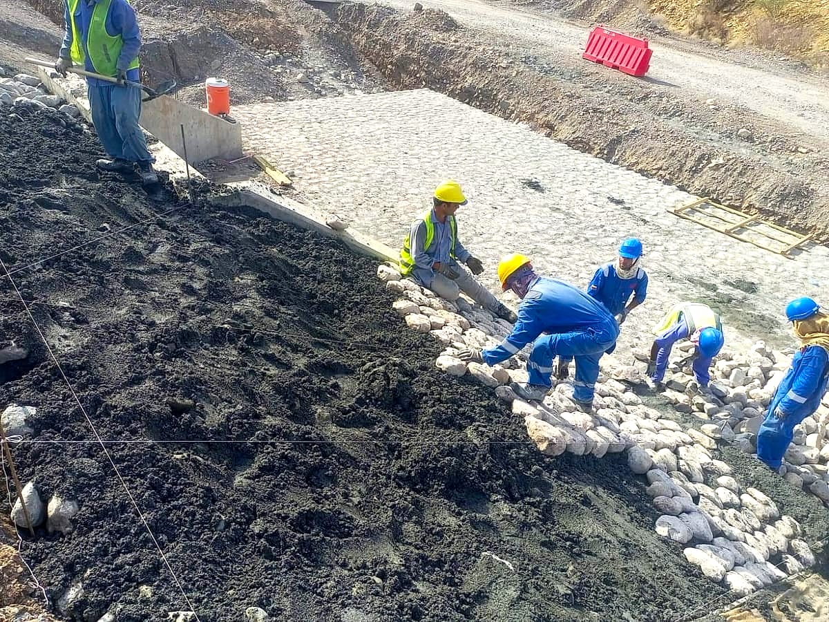 Mortared, gabion and loose riprap for slope stabilisation, erosion control and drainage protection.
